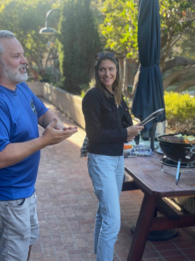 Cooking outside on a small BBQ grill.