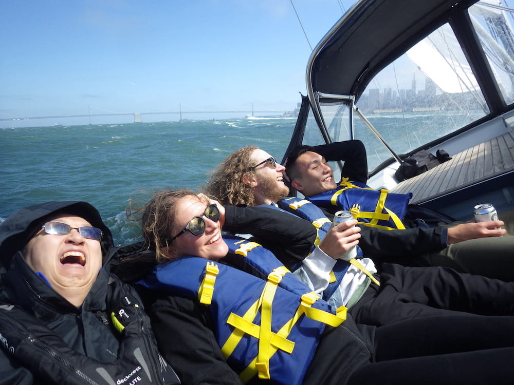 Digital Foundry employees sailing very heeled over on San Francisco Bay.