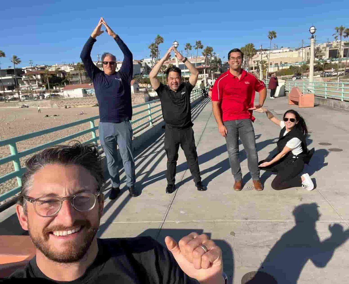 Selfie with colleagues on a beach pier in LA.