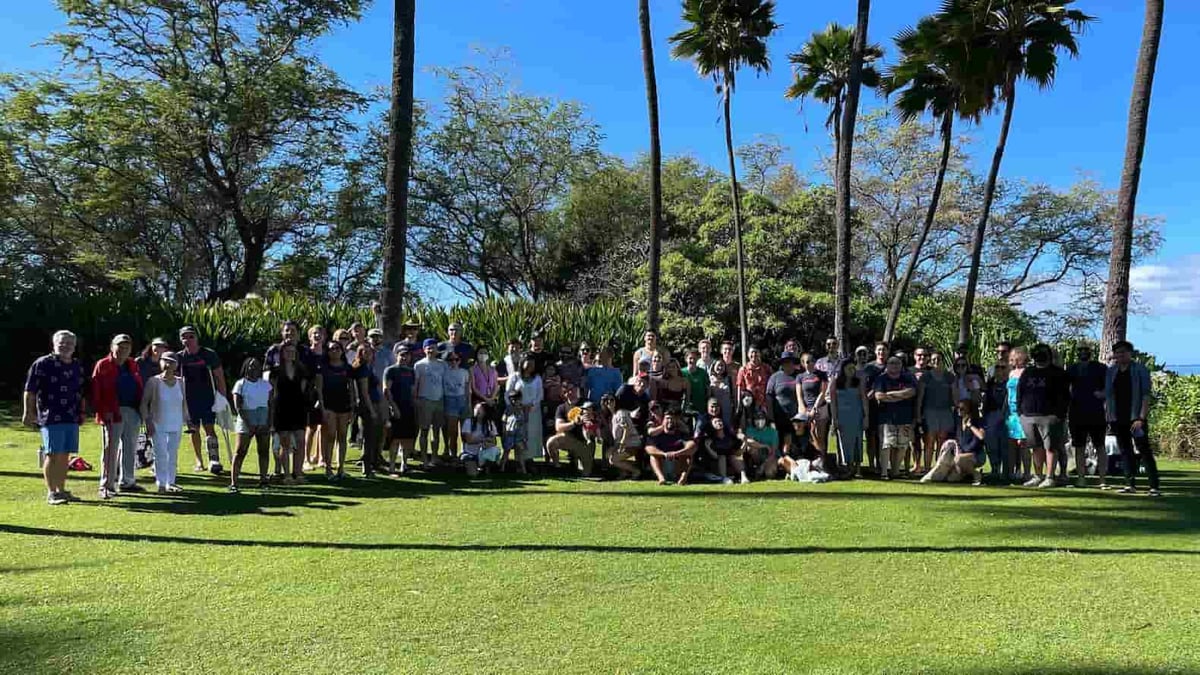 Group photo on a hotel lawn in Maui of Digital Foundry employees and their families.