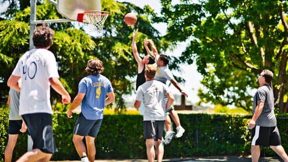 Contested shot in a 4-on-4 basketball game.
